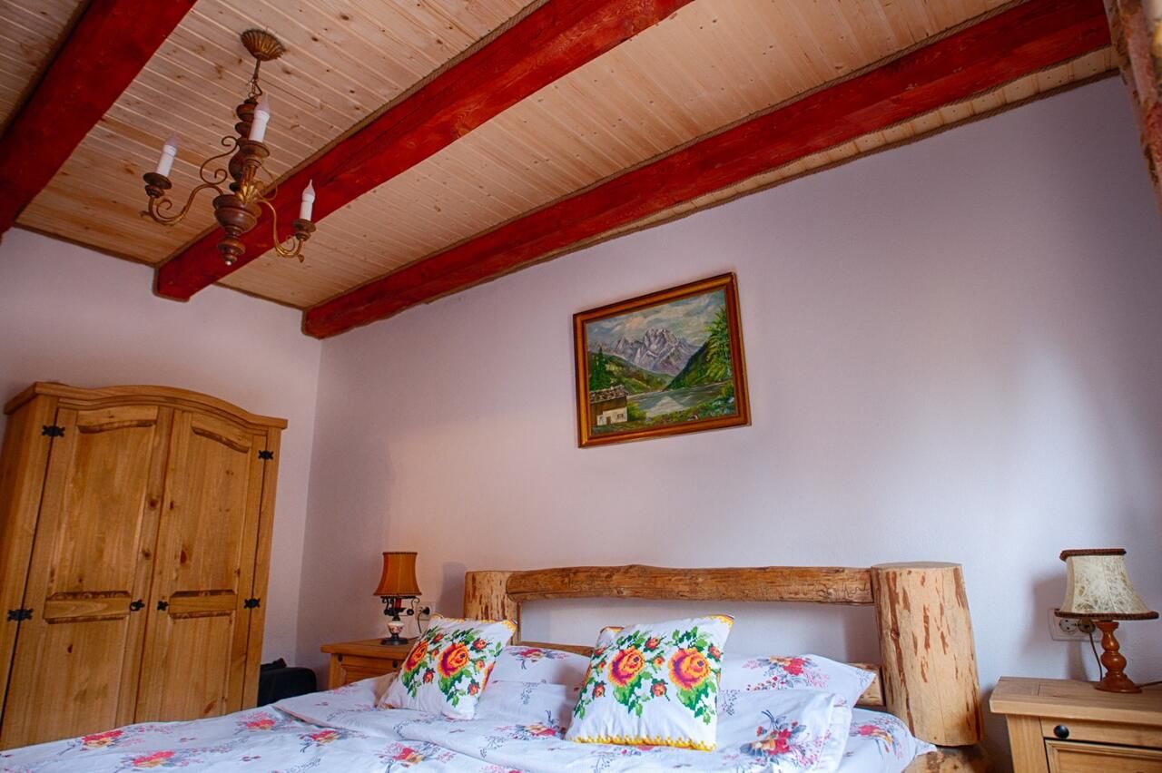 Лоджи Căsuța de Hobbit Perişani-14