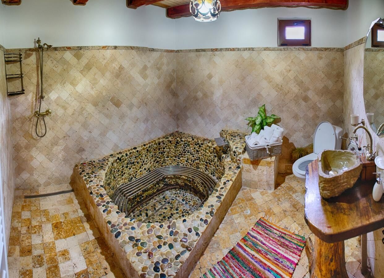 Лоджи Căsuța de Hobbit Perişani-28