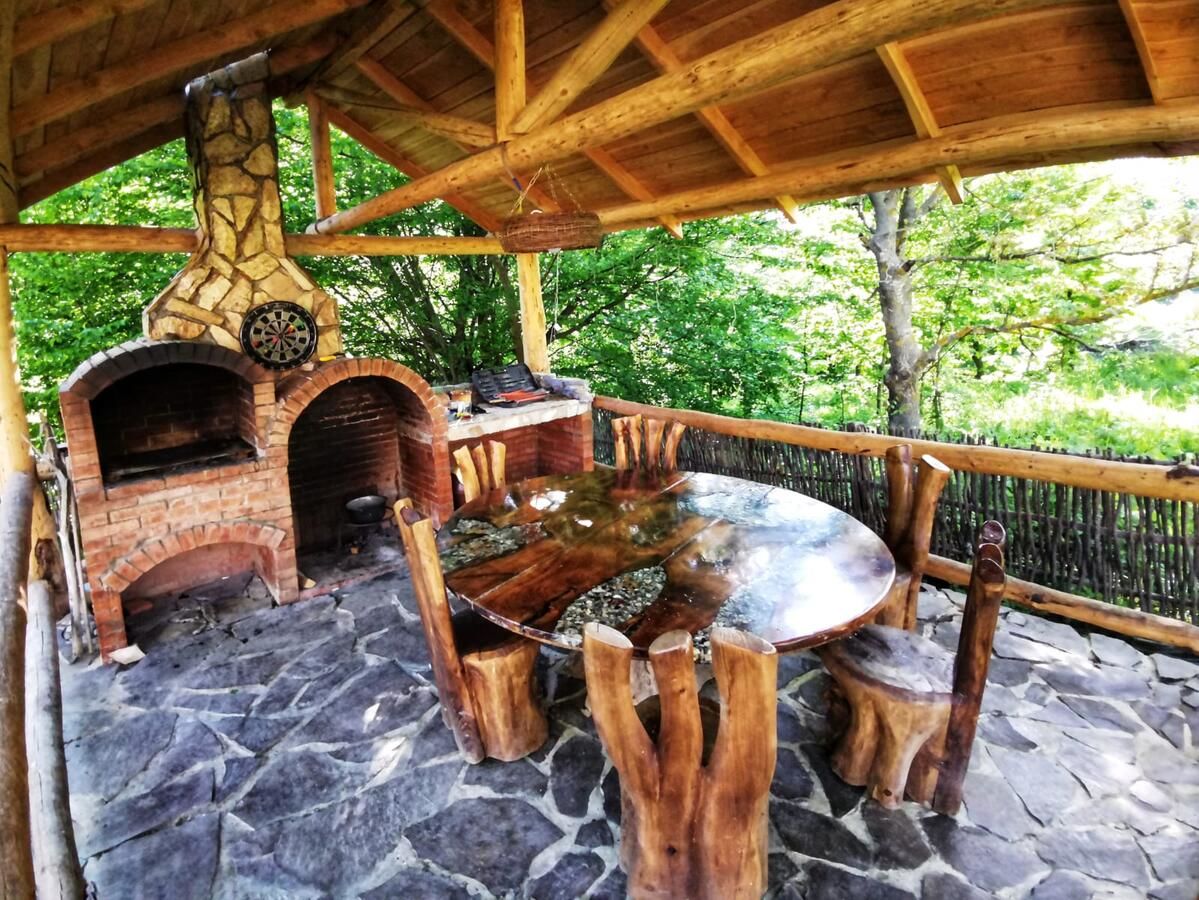 Лоджи Căsuța de Hobbit Perişani-6