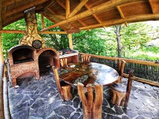 Лоджи Căsuța de Hobbit Perişani-2