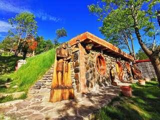 Лоджи Căsuța de Hobbit Perişani-6